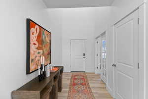 Foyer with light wood-type flooring