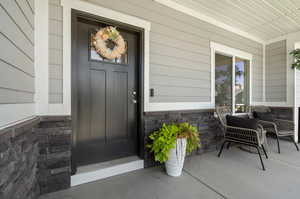 Entrance to property with a porch