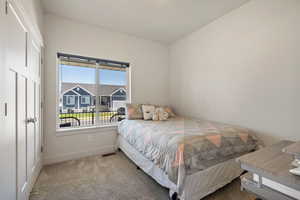 Bedroom featuring carpet