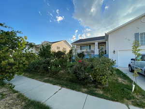 View of front of house with a garage