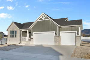 View of front of home featuring a garage