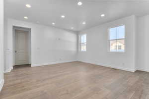 Empty room featuring light hardwood / wood-style floors