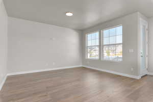 Spare room with light hardwood / wood-style floors