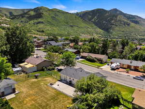 Birds eye view of property with a mountain view