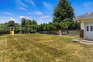 View of yard with a playground