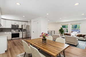 Dining space featuring light hardwood / wood-style flooring, Virtual Staging