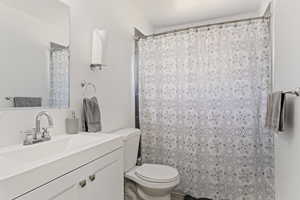 Bathroom with vanity and toilet