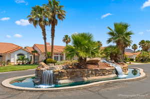 Beautiful water feature near front of home (in street)