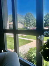 Doorway with a mountain view and a wealth of natural light