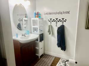 Bathroom with vanity and tile patterned floors