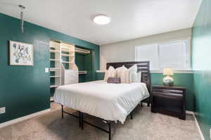 Bedroom featuring carpet flooring