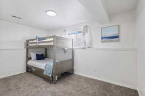 Bedroom featuring carpet floors