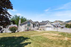 View of front of home with a front lawn