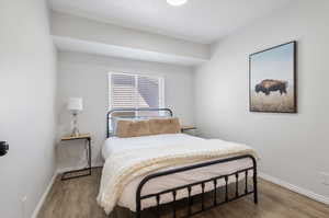 Bedroom featuring hardwood / wood-style flooring