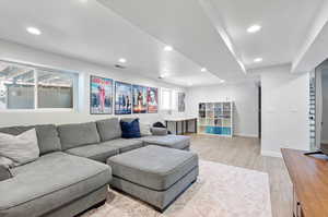 Living room with hardwood / wood-style floors