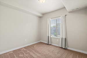 View of carpeted spare room