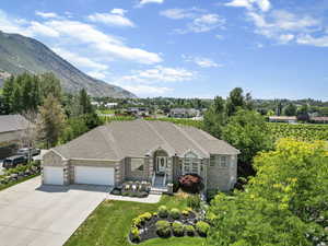 Ranch-style house with a mountain view and a garage