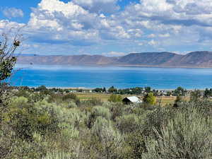 Property view of water with a mountain view