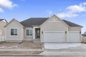 View of front of property with a garage