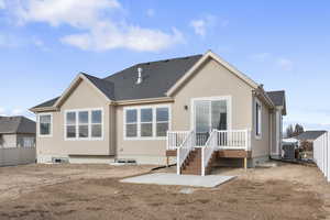 Rear view of property with central air condition unit