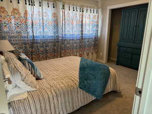 Bedroom featuring carpet floors