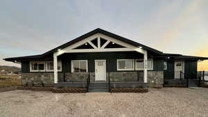 View of front of house featuring covered porch