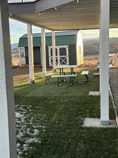 View of yard with a shed