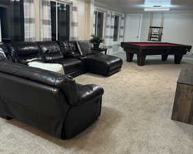 Game room featuring pool table and carpet