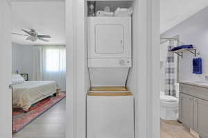 Laundry nook conveniently located near all of the bedrooms makes laundry easier to start and to put away.