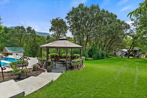 View of yard featuring a gazebo and a patio area