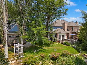 View of yard featuring a Trex deck