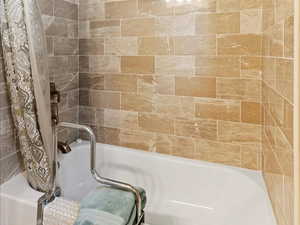 Bathroom featuring shower / tub combo