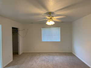 Bedroom featuring carpet floors and ceiling fan