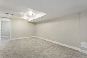 Basement with carpet