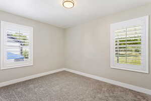 View of carpeted spare room