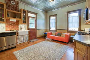 Main floor kitchen with stamped tin ceilings