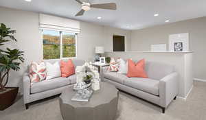 Living room/loft space with light colored carpet and lots of natural light. Ceiling fan is not included in this home.Photo of the model; actual materials and colors selected may vary.