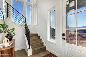 Doorway featuring a mountain view and wood-type flooring