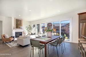 Dining room with dark wood-type flooring