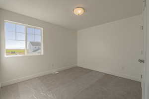 Bedroom 2 *Photo of similar plan in community, colors and options will vary*