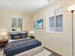 View of carpeted bedroom