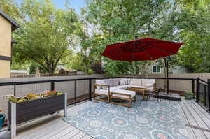 Wooden deck with an outdoor living space