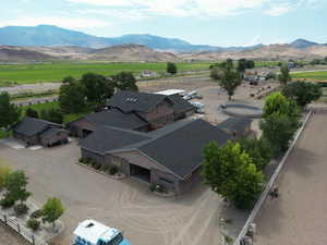 Birds eye view of property with a mountain view