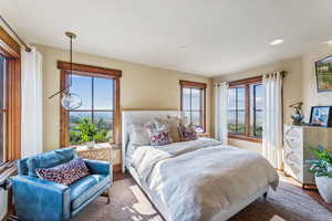 Bedroom with hardwood / wood-style floors