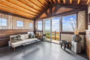 Sunroom / solarium with vaulted ceiling