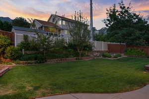 View of yard at dusk