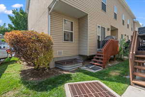 Backyard with small porch