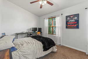 upstairs second bedroom with vaulted ceiling