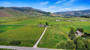 Aerial view featuring a mountain view and a rural view