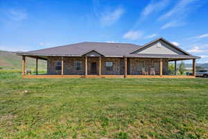 View of front of house with a front lawn